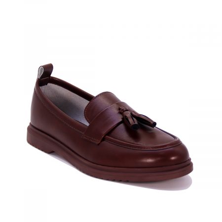 Mocassin à semelle souple avec pompons décoratifs