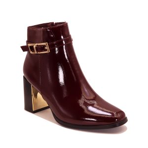 Bottine élégante à boucle dorée et talon géométrique